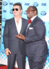 Randy Jackson and Simon Cowell arrive at the American Idol Season 8 Grand Finale held at Nokia Theatre L.A. Live on May 20, 2009 in Los Angeles, California