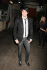 Adam Lambert candids wearing a slim dark denim pants with a white shirt under a black semi formal jacket at Regis and Kelly in New York city on May 27th 2009 6