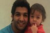 Ibrahim Dashti with a young baby boy fan