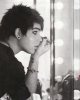 Adam Lambert putting makeup