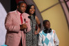 Keke Palmer with Anthony Anderson and Bobbe J Thompson present onstage during the 2009 BET Awards held at the Shrine Auditorium on June 28th 2009 2