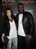 Kim Kardashian and Reggie Bush attend the AXE Instinct Power Of Leather Launch Party on June 24th 2009 9