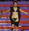 Kara DioGuardi appeares wearing a black bikini under her dress on stage during the season finale of American Idol 8