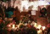 candels and flowers outside the gates of Michael Jackson Holmby Hills home