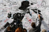 fans sign a large poster of Michael Jackson outside of the Michael Jackson public memorial service held at Staples Center on July 7th 2009 in Los Angeles