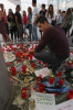 a fan lights candles at a memorial to the late pop icon Michael Jackson on July 7th 2009 in Berlin Germany