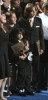 Michael Jackson's daughter Paris Jackson and sons Blanket; Prince Michael Jackson II and Prince Michael Jackson stand on stage during their father memorial