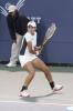 Sania Mirza during a tennis game playing hard