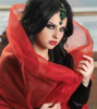 Diana Karazone in a red shawl