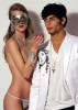 Jesus Luz picture with a topless model from the 2010 Ona Saez fashion modeling