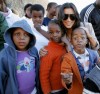 kim kardashian at the Diamond Empowerment Fund tour of Africa on July 14th 2009 with the kids