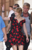 Emilie de Ravin on the filming set of her upcoming movie Remember Me wearing a black and red floral open shoulders dress 3