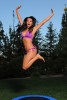 Kim Kardashian HighQuality wallpaper Photoshoot in July 2009 wearing an purple two pieces bikini 4