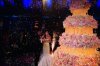 Haifa Wehbe picture from her wedding to Abu Hashima cutting the huge floral cake