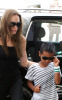 Angelina Jolie and her son Maddox minutes before their flight to Amman Jordan on July 21st 2009 to attend the 24th annual Arab Childrens Congress held by the Noor Al Hussein Foundation 5