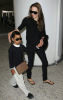 Angelina Jolie arrives at LAX airport in Los Angeles with her oldest son Maddox after a flight from London Heathrow Airport on July 24th 2009 1