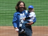 Eddie Vedder holds his daughter Olivia at a baseball game between the San Diego Padres and Chicago Cubs on May 14th 2006 in Chicago 1