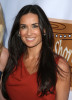 Demi Moore picture wearing a sleevless red dress at the 5th Annual HollyShorts 2009 Opening Night Celebration held at the Directors Guild of America on August 6th 2009 in Los Angeles