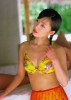 Noriko Sakai poster photos for print in a yellow bra