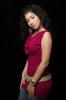 Ayten Amer professional studio photo shoot in a dark pink sleevless shirt