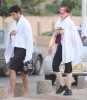 picture of Madonna and Jesus Luz walking towards a beach known as the Frishman Beach in Tel Aviv Israel during her two concerts in Israel on September 4th 2009