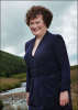 Susan Boyle new album promo photo shoots published in Daily Mirror on September 4th 2009 wearing a dark blue suit