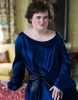 Susan Boyle make over photos in a dark blue dress and wearing full makeup