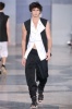 Marlon Teixeira on the runway at the Paris Kris Van Assche Spring Summer 2010 fashion show 2