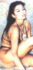 Haifa Wehbe old picture before becoming a singer and before plastic surgery wearing a black bikini on the beach