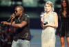 Kayne West onstage withTaylor Swift after she won the Best Female Video award at the 2009 MTV Video Music Awards at Radio City Music Hall on September 13, 2009 in New York City