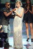 Kayne West onstage withTaylor Swift after she won the Best Female Video award at the 2009 MTV Video Music Awards at Radio City Music Hall on September 13, 2009 in New York City