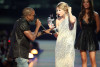 Kanye West jumps onstage after Taylor Swift won the Best Female Video award during the 2009 MTV Video Music Awards at Radio City Music Hall on September 13th 2009