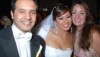 Arab Celebrity photo of Enji Sharaf and her husband at their wedding day