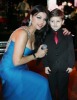 Haifa Wahbi picture during a concert wearing a glam baby blue dress with a boy fan