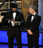 LL Cool J and Chris ODonnell onstage presenting the Outstanding Supporting Actress In A Drama Series award during the 61st Primetime Emmy Awards