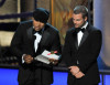 LL Cool J and Chris ODonnell onstage presenting the Outstanding Supporting Actress In A Drama Series award during the 61st Primetime Emmy Awards