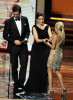 Tina Fey and actor Jon Hamm present the Outstanding Supporting Actress in a Comedy Series award  to actress Kristin Chenoweth during the 61st Primetime Emmy Awards