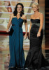 Amy Poehler and Julia Louis Dreyfus present the Outstanding Supporting Actor in a Comedy Series award onstage during the 61st Primetime Emmy Awards