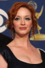 Christina Hendricks poses in the press room at the 61st Primetime Emmy Awards