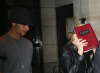 Jesus Luz picture with his girlfriend Madonna as she hides her face with a copy of the book Zohar to avoid the flashes of paparazzis cameras on september 22nd 2009 in New York 4