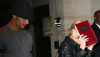 Jesus Luz picture with his girlfriend Madonna as she hides her face with a copy of the book Zohar to avoid the flashes of paparazzis cameras on september 22nd 2009 in New York 2