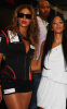 Beyonce Knowles with Nicole Scherzinger at the Singapore Auto Racing F1 GP event on September 26th 2009