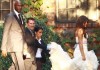 Khloe Kardashian wedding picture with her groom Lamar Odom walking behind her