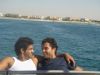 Summer Beach Photo of Ibrahim Dashi with Mohamad Bash on a boat in the middle of the sea