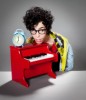 Sliimy promotional photo shoot with a mini red piano