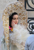 Dita Von Teese poses for a photo shoot for Harpers Bazaar on October 10th 2009 in a white and golden floral dress 7