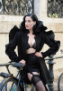 Dita Von Teese poses for a photo shoot for Harpers Bazaar on October 10th 2009 wearing black