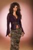 Lebanese singer Nelly Maqdesy in a leather purple jacket 4