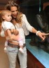 Alessandra Ambrosio spotted with her baby daughter Anja beside a fish tank in the lobby of their hotel in Miami on October 12th 2009 4