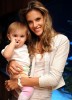 Alessandra Ambrosio spotted with her baby daughter Anja beside a fish tank in the lobby of their hotel in Miami on October 12th 2009 3